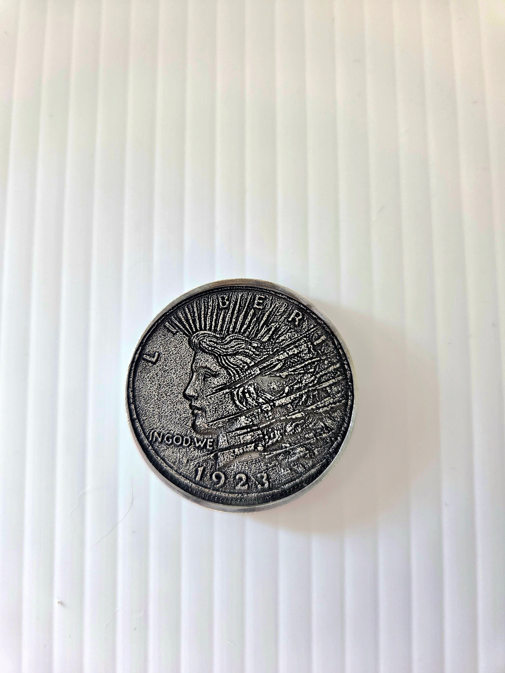 Custom engraved coin - front view, dark finish