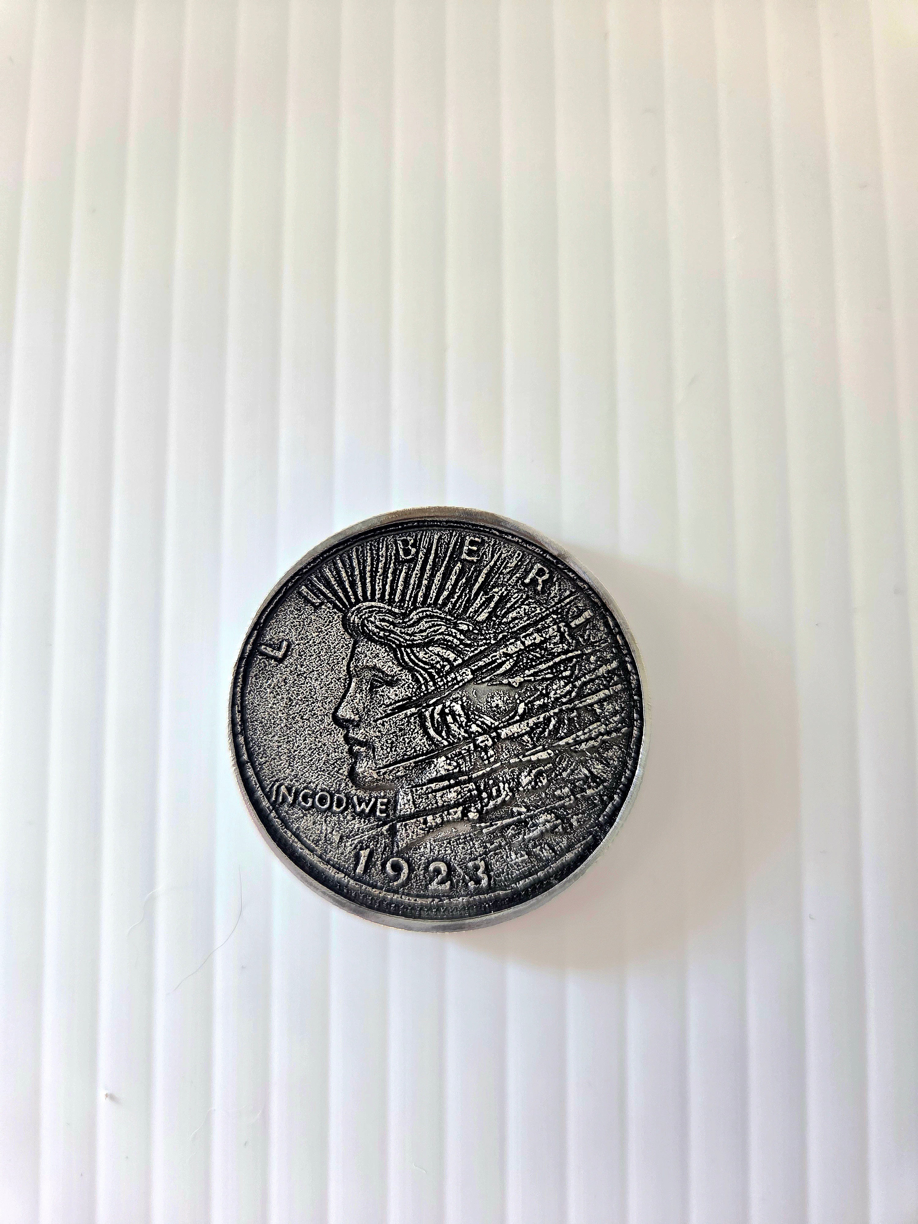 Custom engraved coin - front view, dark finish