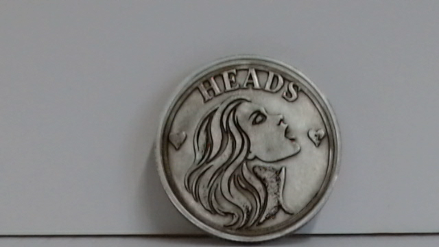 Front of a zinc 40mm custom engraved challenge coin